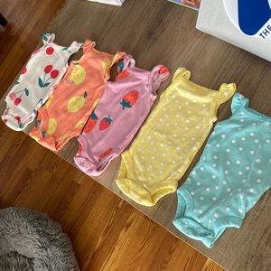 Newborn onesies - all outfits included - never worn